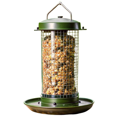 Deer feeder timer with a digital display and adjustable settings. The timer is mounted on a metal bracket and features easy-to-use buttons for programming feeding schedules. The background shows a wooded area, highlighting the feeder's outdoor use."